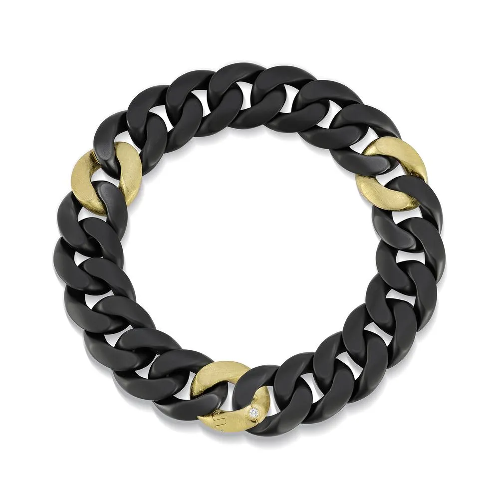 GROUMETTE MATTE BLACK CERAMIC WITH THREE GOLD LINKS by Roberto Demeglio